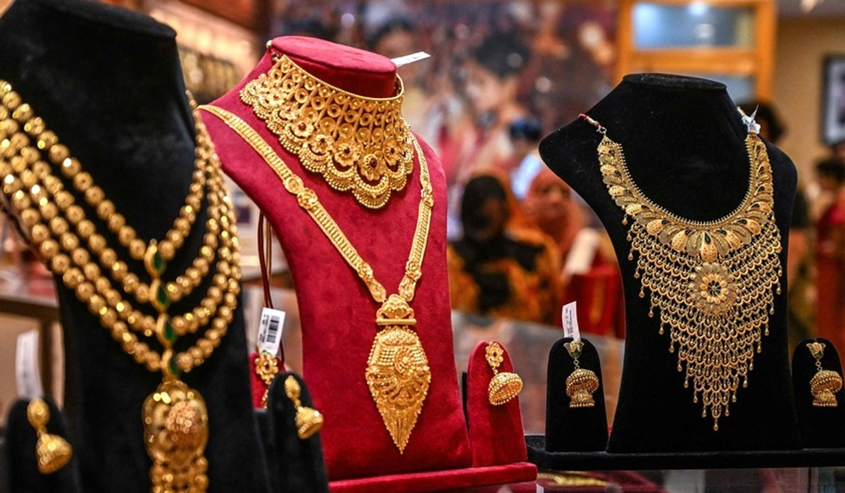Gold, silver trade lower amid renewed West Asia tensions
