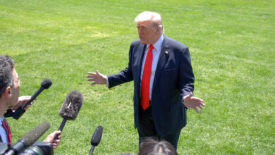 Trump reviews Iran deal, hints troop cuts