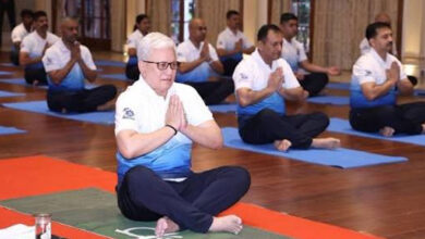 Maharashtra Governor Jishnu Dev Varma joins Coast Guard in performing yoga