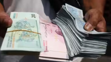 Iran's currency hits record low as US moves to unveil new sanctions