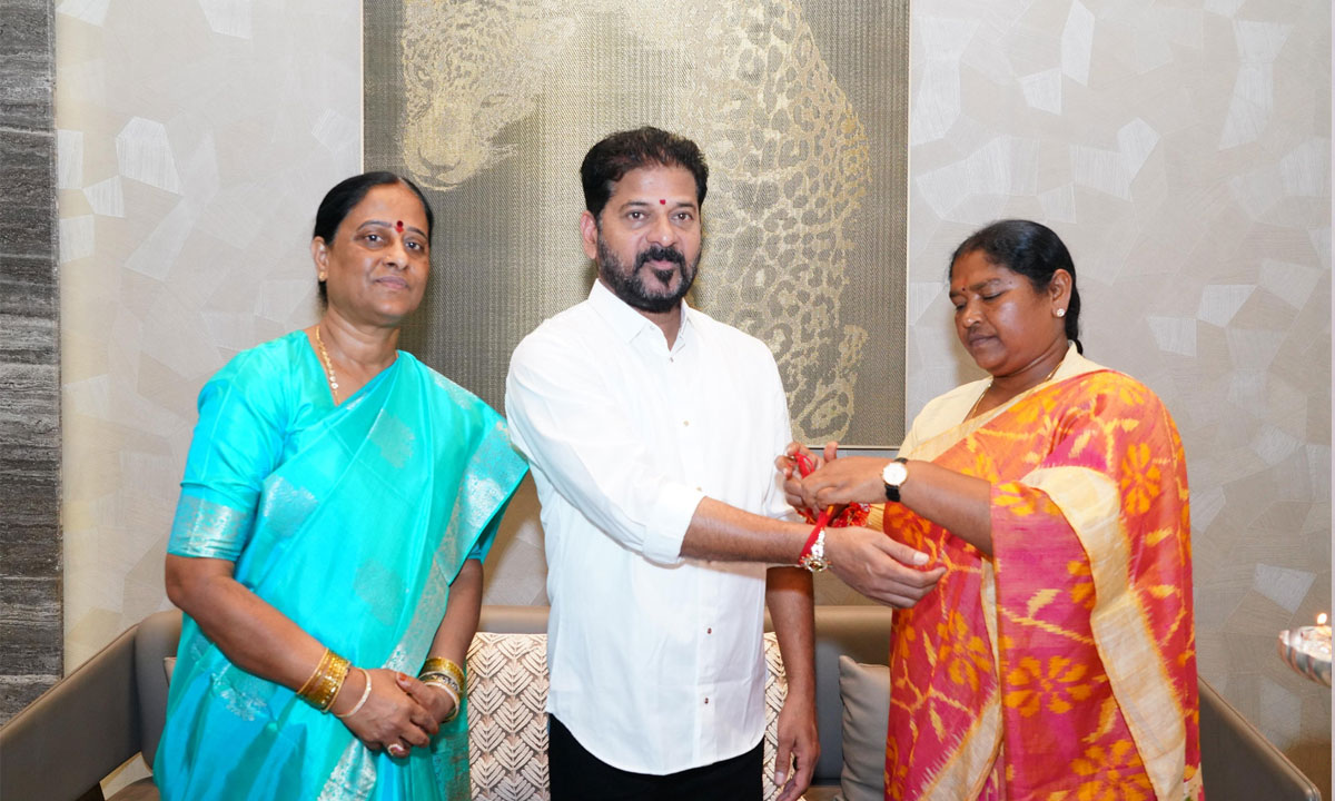 Ministers Seethakka and Konda Surekha Tie Rakhi to CM Revanth Reddy