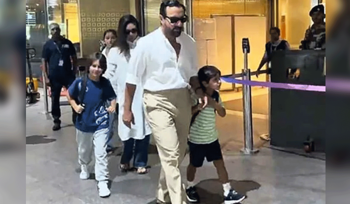 Taimur Ali Khan greets staff, Jeh looks puzzled as they arrive from Europe trip with Kareena Kapoor & Saif Ali Khan